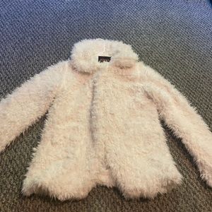 Cute ivory fuzzy jacket.